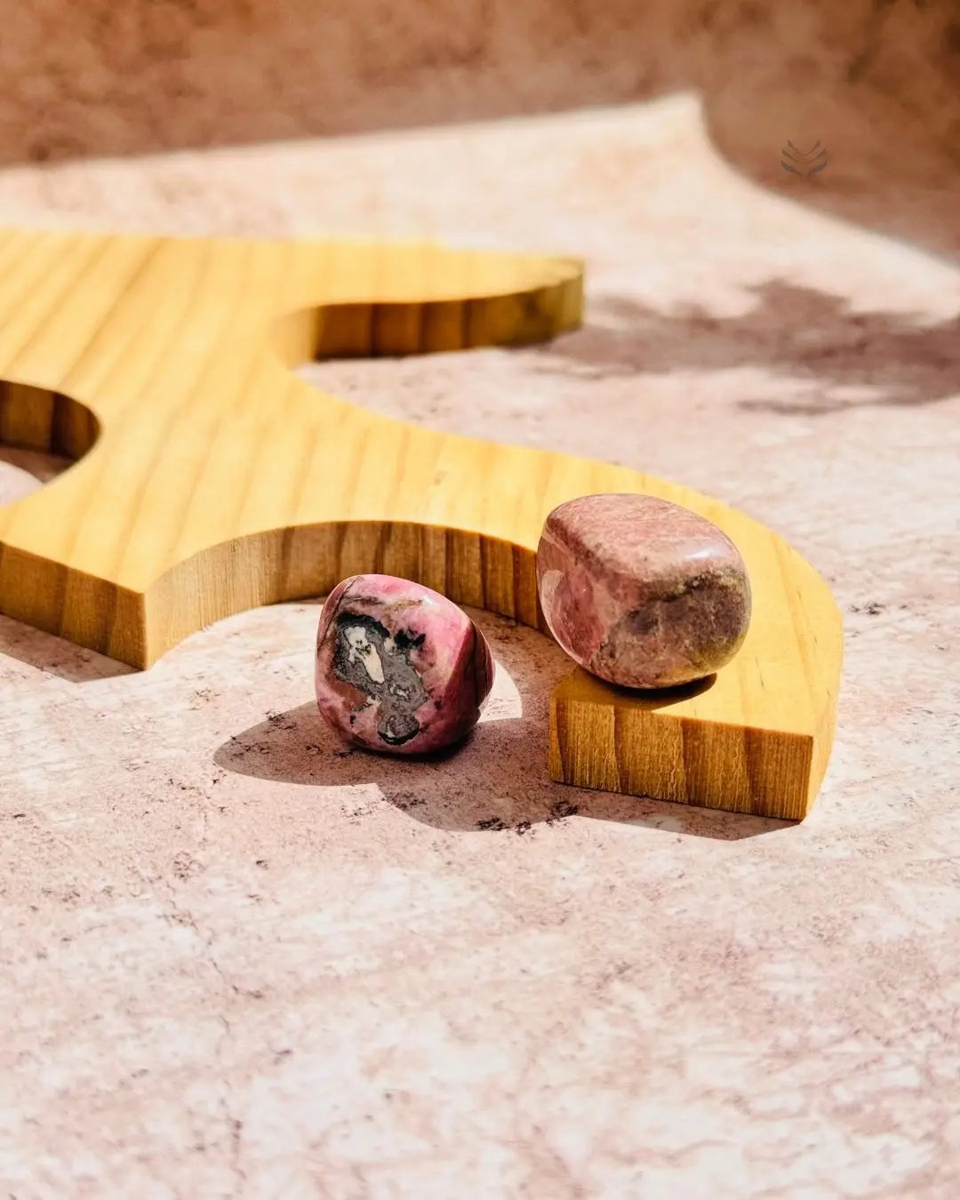 Light-Coded Rhodonite Tumbles