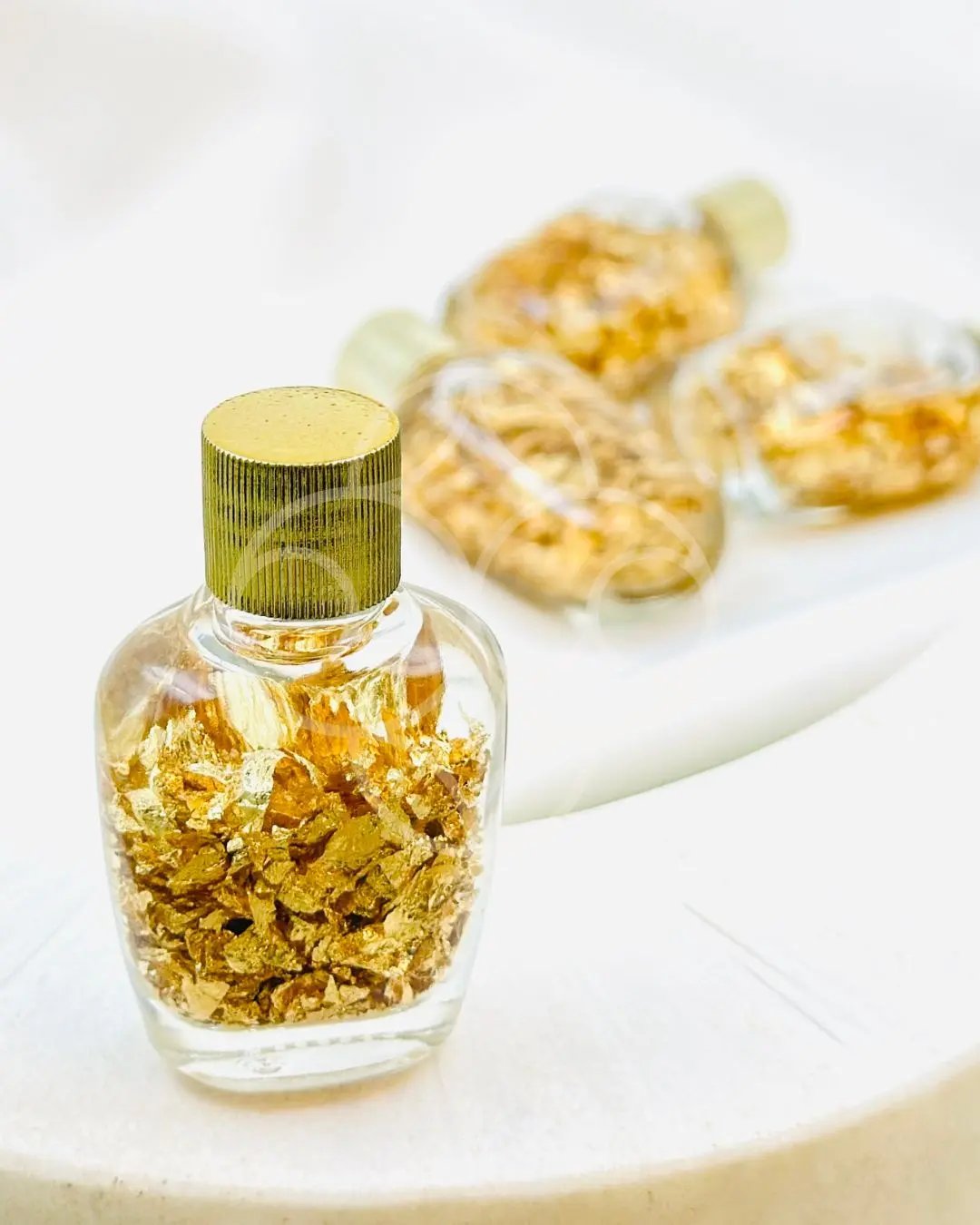 Light-Coded Gold Anointing Bottle