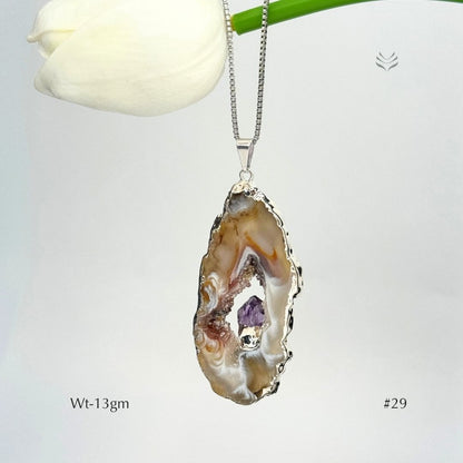 Geode With Pinned Amethyst Pendant
