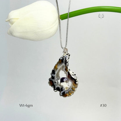 Geode With Pinned Amethyst Pendant