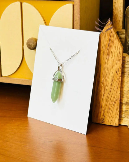 Growth-Focused Double Terminated Crystal Pendant for Positive Change