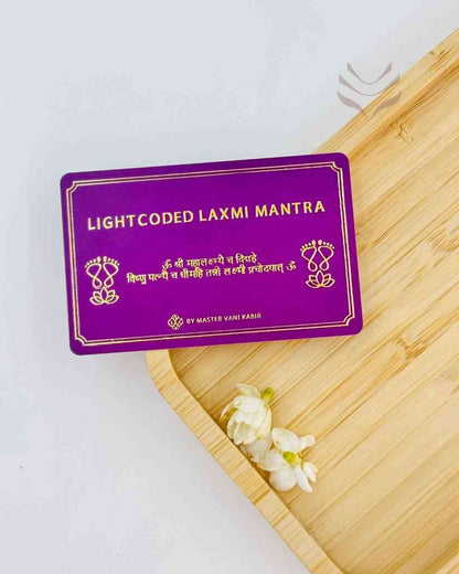 Light-Coded Laxmi Mantra Card on wooden tray